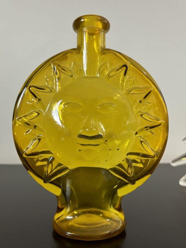 70s Sun face yellow glass bottle